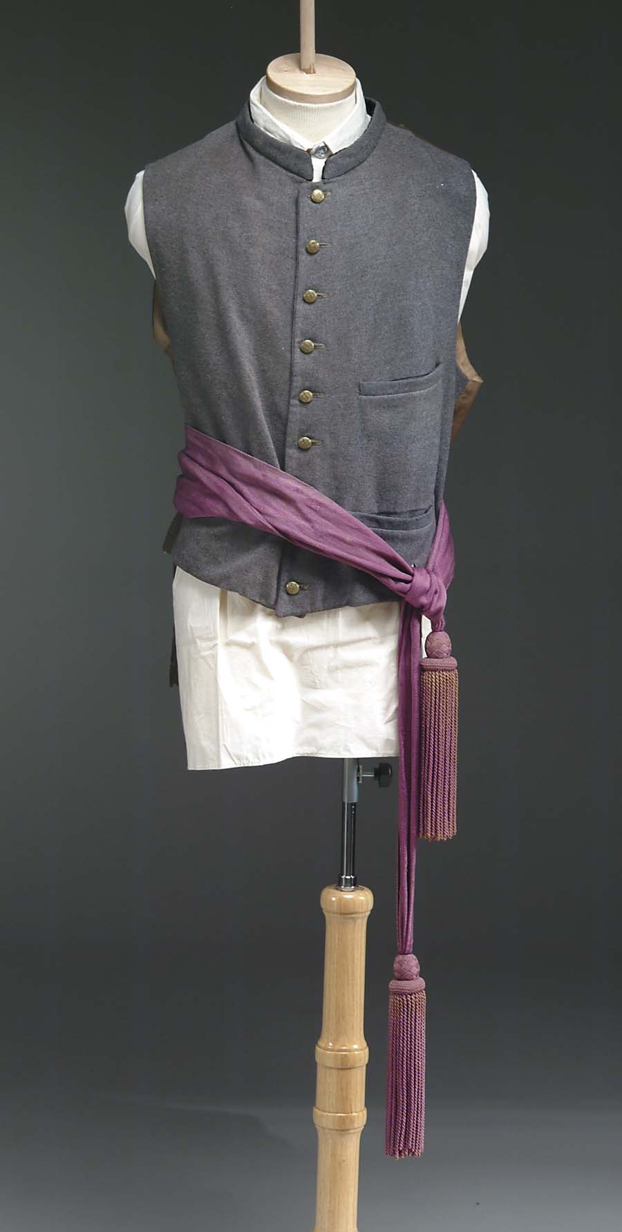 Appraisal: CONFEDERATE ERA VEST AND SASH Single breasted gray wool vest