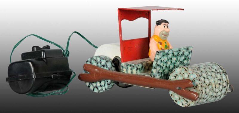 Appraisal: Marx Tin Plastic Fred Flintstone Flivver Toy Description Battery-operated Toy