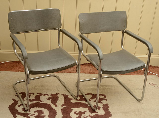 Appraisal: A PAIR OF CHROME PLATED CANTILEVER CHAIRS after designs by