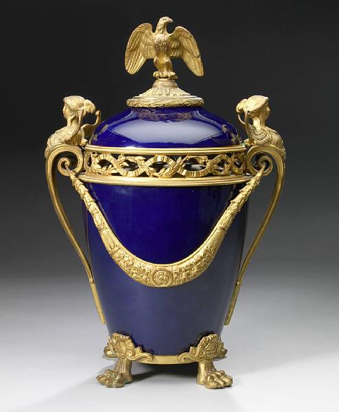 Appraisal: An Empire style gilt bronze mounted cobalt blue porcelain potpourri