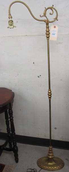 Appraisal: A GOLD PAINTED CAST IRON FLOOR BRIDGE LAMP American c