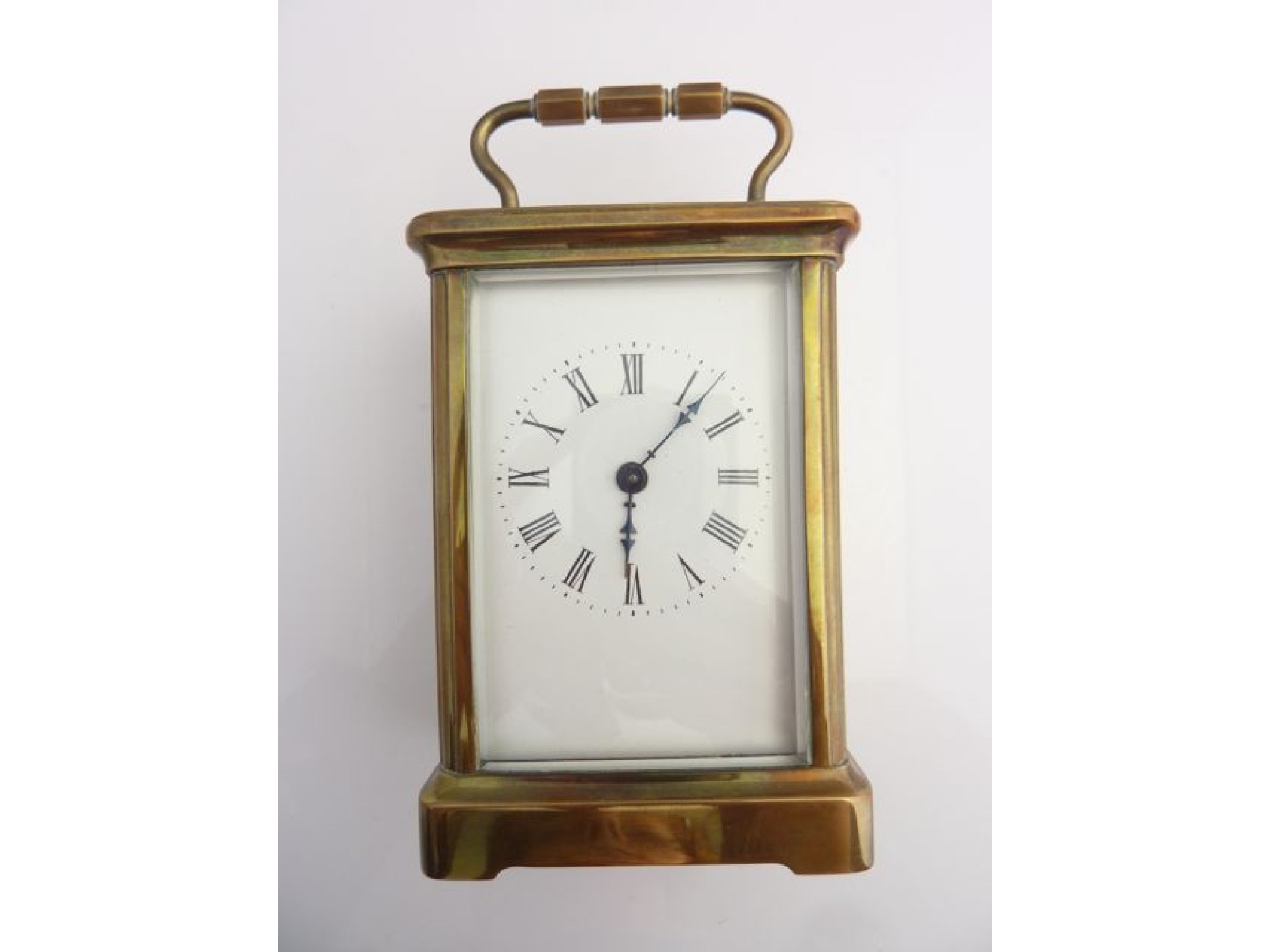 Appraisal: A simple brass carriage clock with eight day timepiece