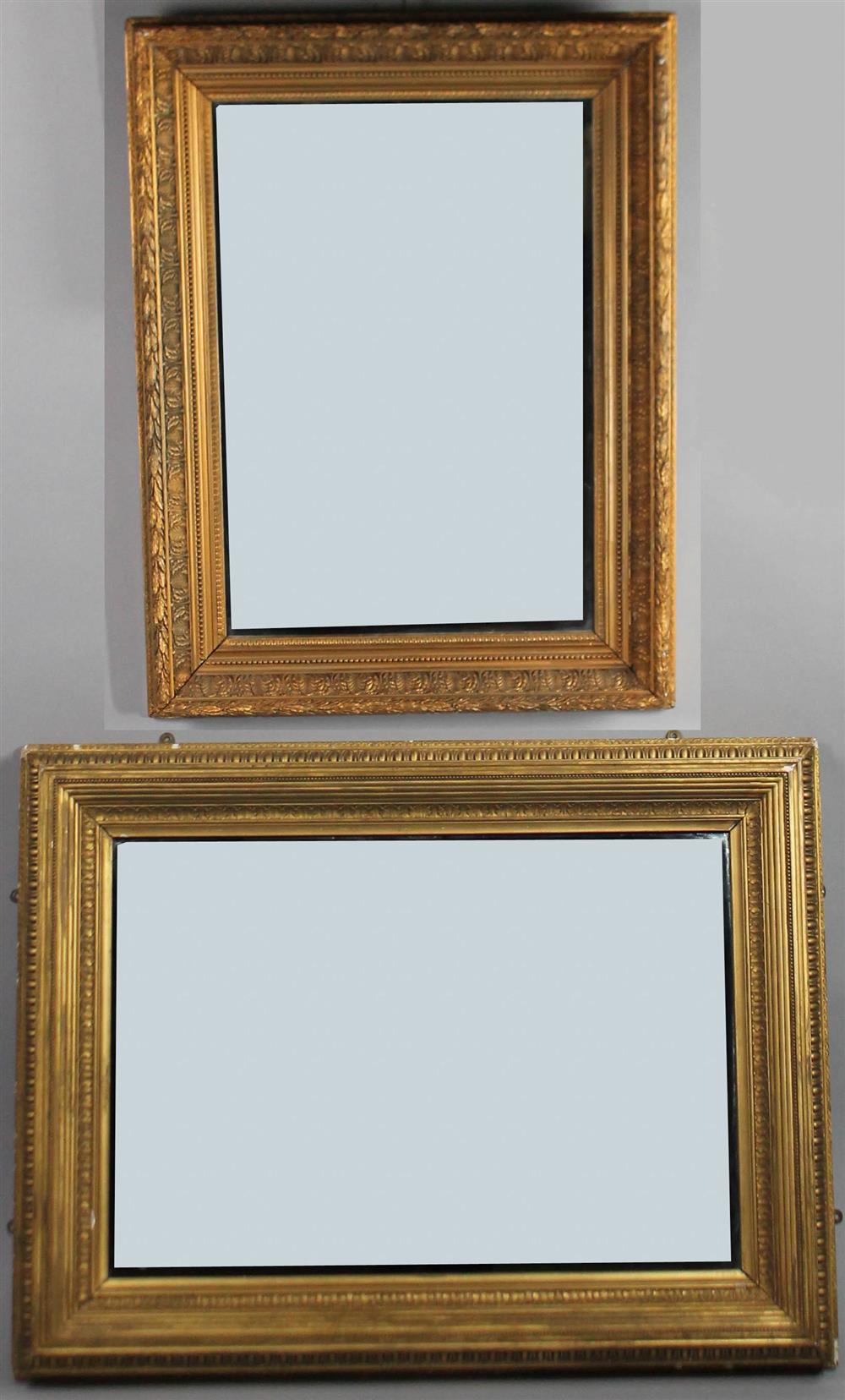 Appraisal: TWO GILT MIRRORS with ornately decorated gold frames including acanthus