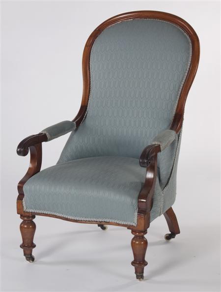 Appraisal: A Victorian mahogany frame arm chair the moulded arched back