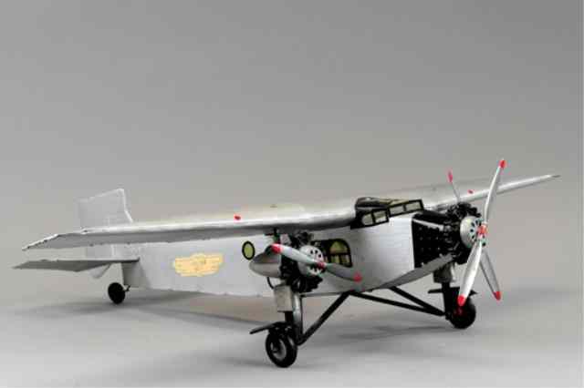 Appraisal: a AERO MODEL SILVER ACE TRI-MOTOR Construction kit airplane done