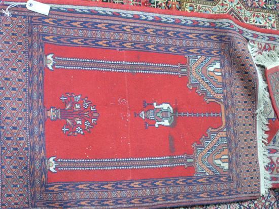 Appraisal: Persian red ground prayer mat by and a red ground