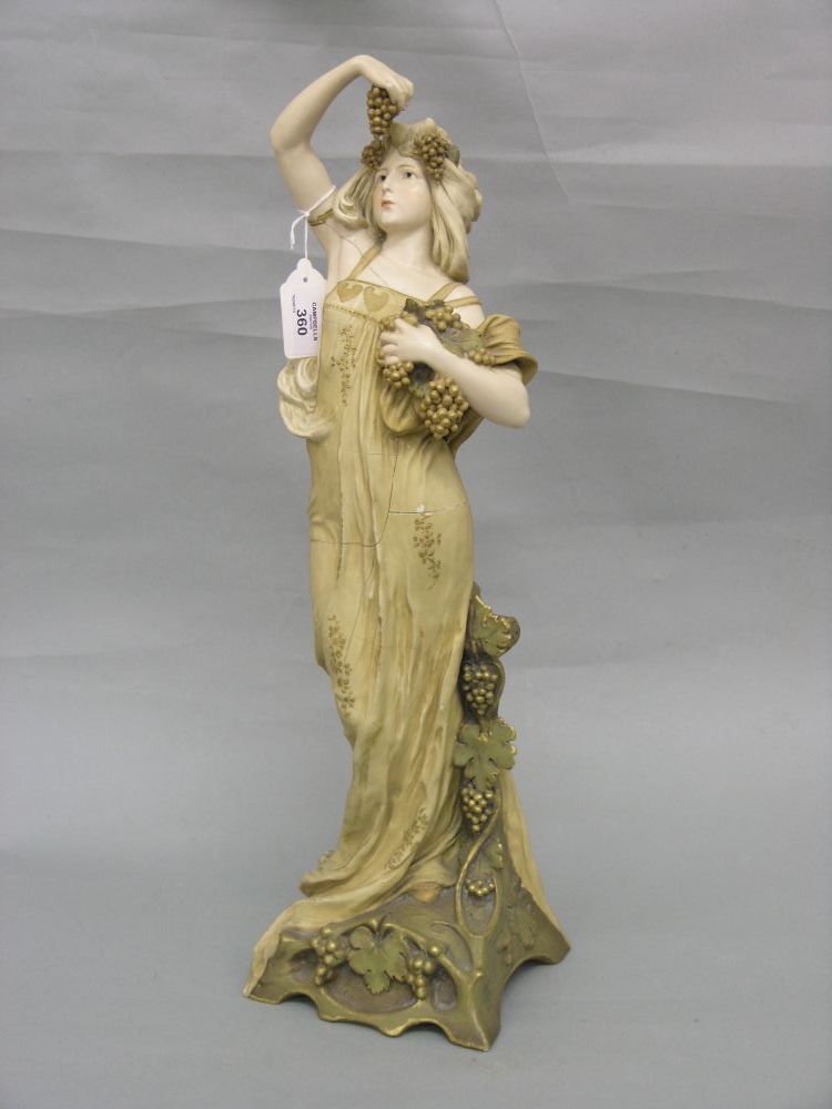 Appraisal: An Ernst Wahliss Vienna statuette a maiden wearing long robe