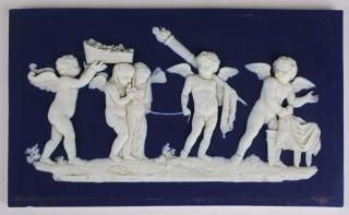 Appraisal: Wedgwood dark blue Jasperware bas relief plaque of cherub frieze