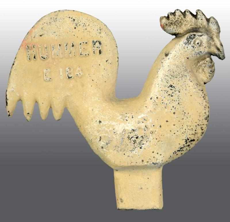 Appraisal: Small Cast Iron Rooster Windmill Weight Description Marked Hummer E