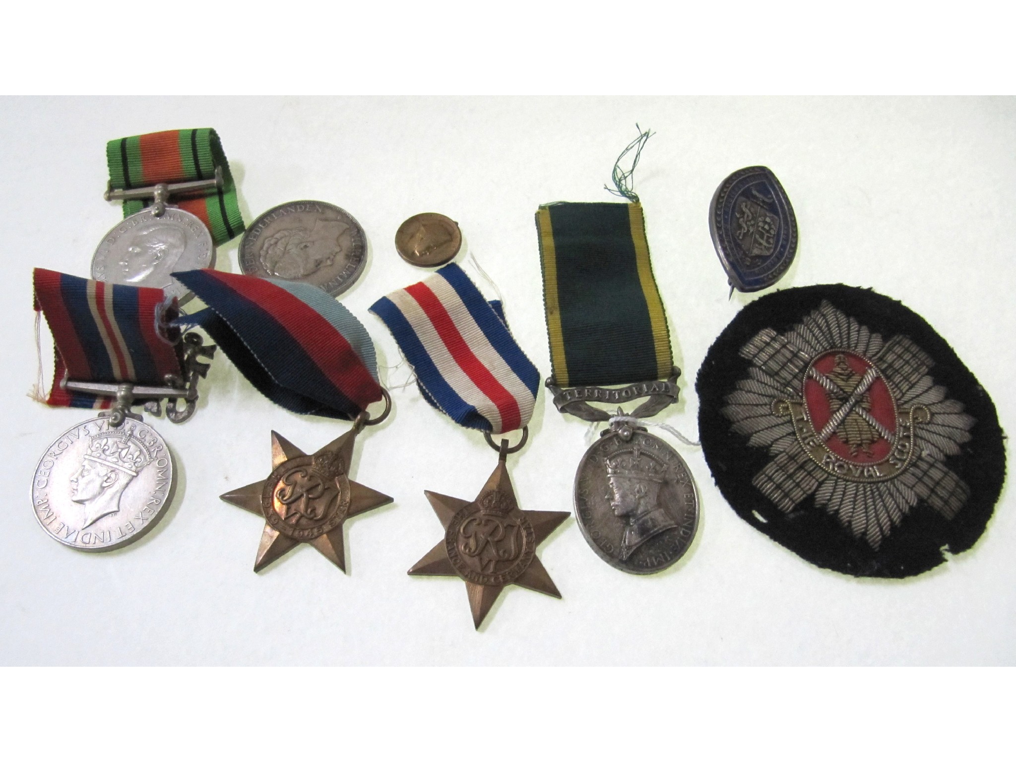 Appraisal: A lot comprising a territorial long service medal to Gnr