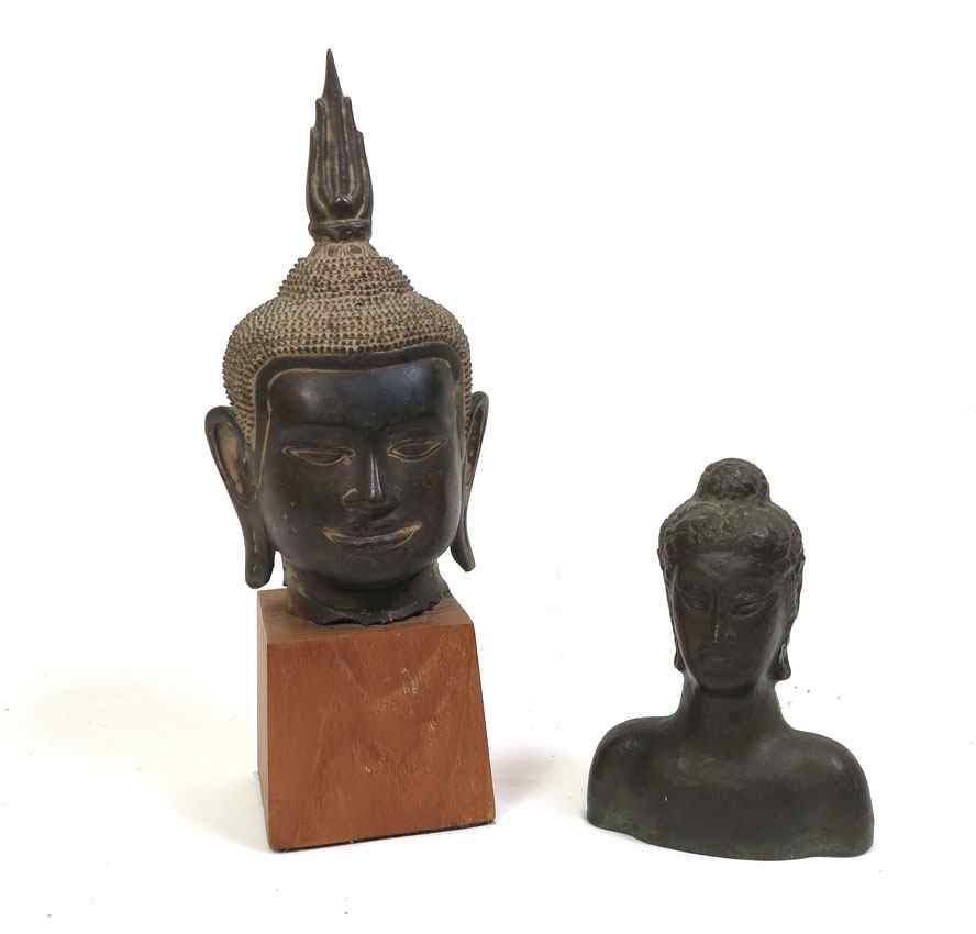 Appraisal: TWO BRONZE HEADS OF BUDDHA Larger Thai patinated head ''