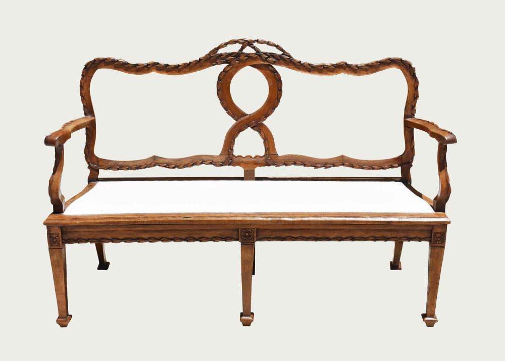 Appraisal: ITALIAN ROCOCO CARVED WALNUT SETTEE th Century The interlaced splat