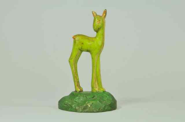 Appraisal: FAWN DOORSTOP Cast iron marked ''No ''Taylor Cook '' depicts