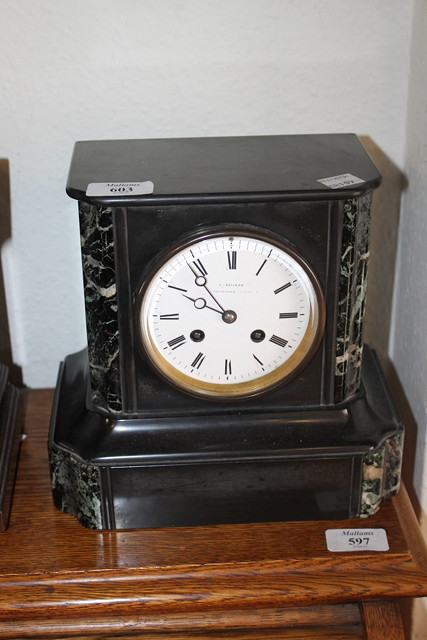 Appraisal: A VICTORIAN BLACK SLATE MANTEL CLOCK with striking movement