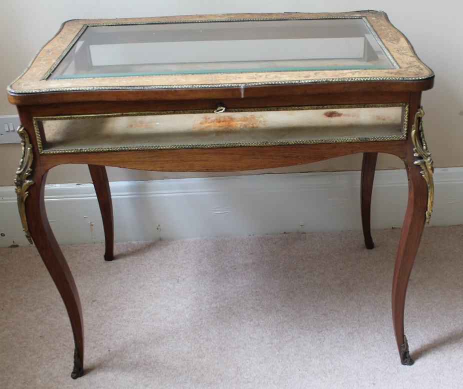 Appraisal: A thC rosewood marquetry bijouterie table with ormolu mounted serpentine