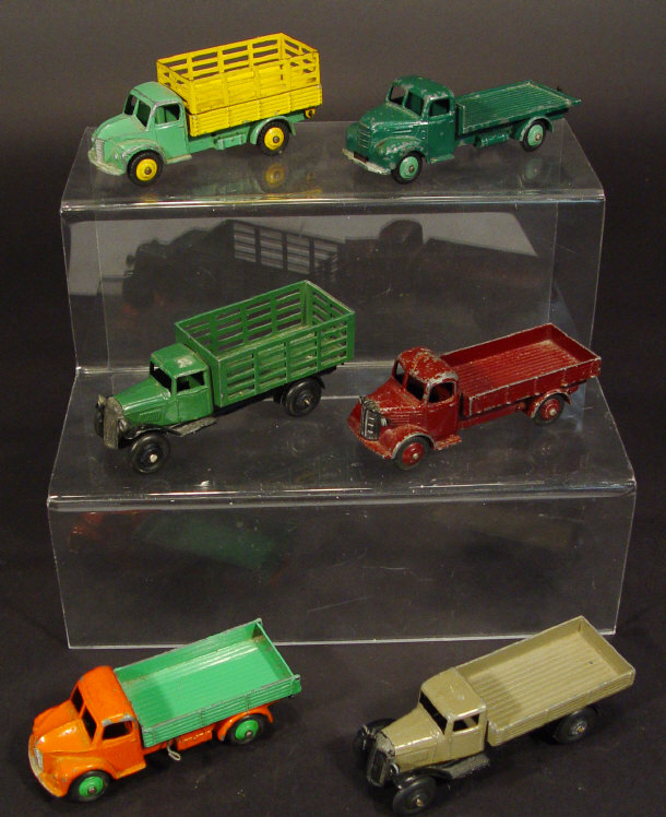 Appraisal: Six Dinky toys die-cast commercial flatbed lorries including a Fordson