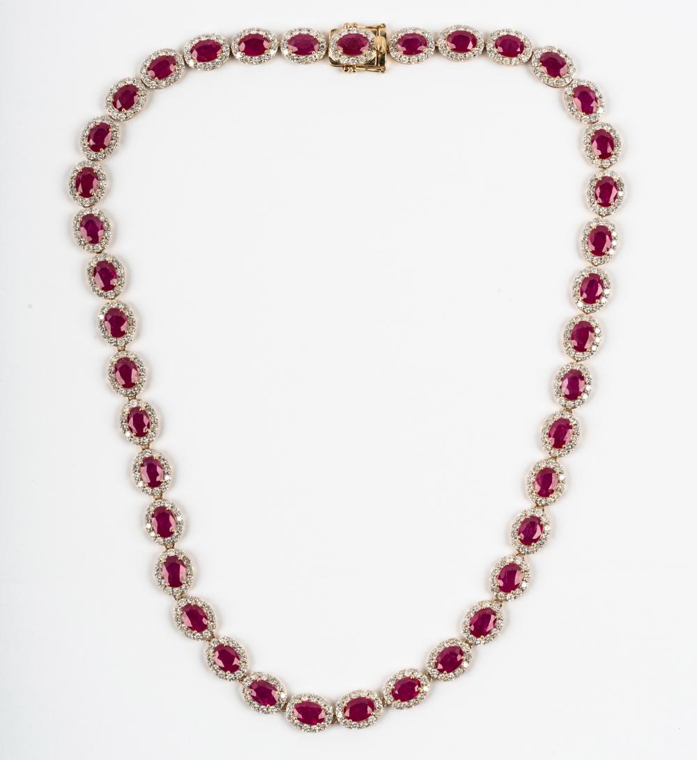 Appraisal: KARAT WHITE GOLD DIAMOND RUBY NECKLACEcontaining oval shape mixed cut