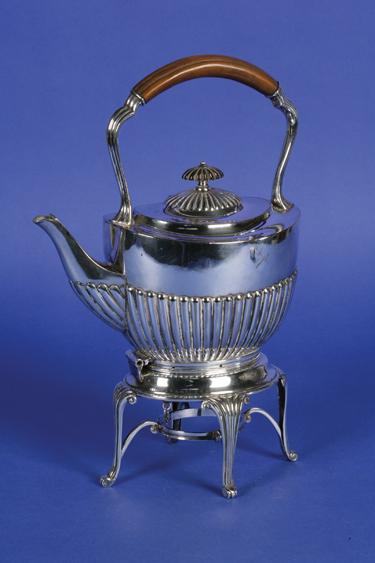 Appraisal: A VICTORIAN PLATED SPIRIT KETTLE ON STAND of tapering oval