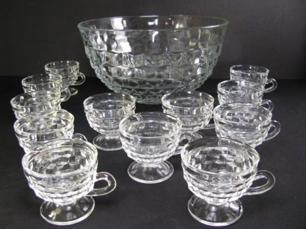 Appraisal: Fostoria American clear punch bowl with twelve footed punch cups