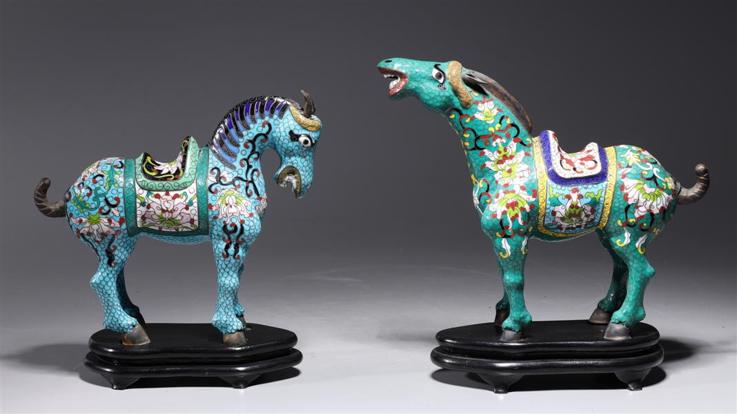 Appraisal: Two Chinese cloisonne enameled horse statues in blue and green