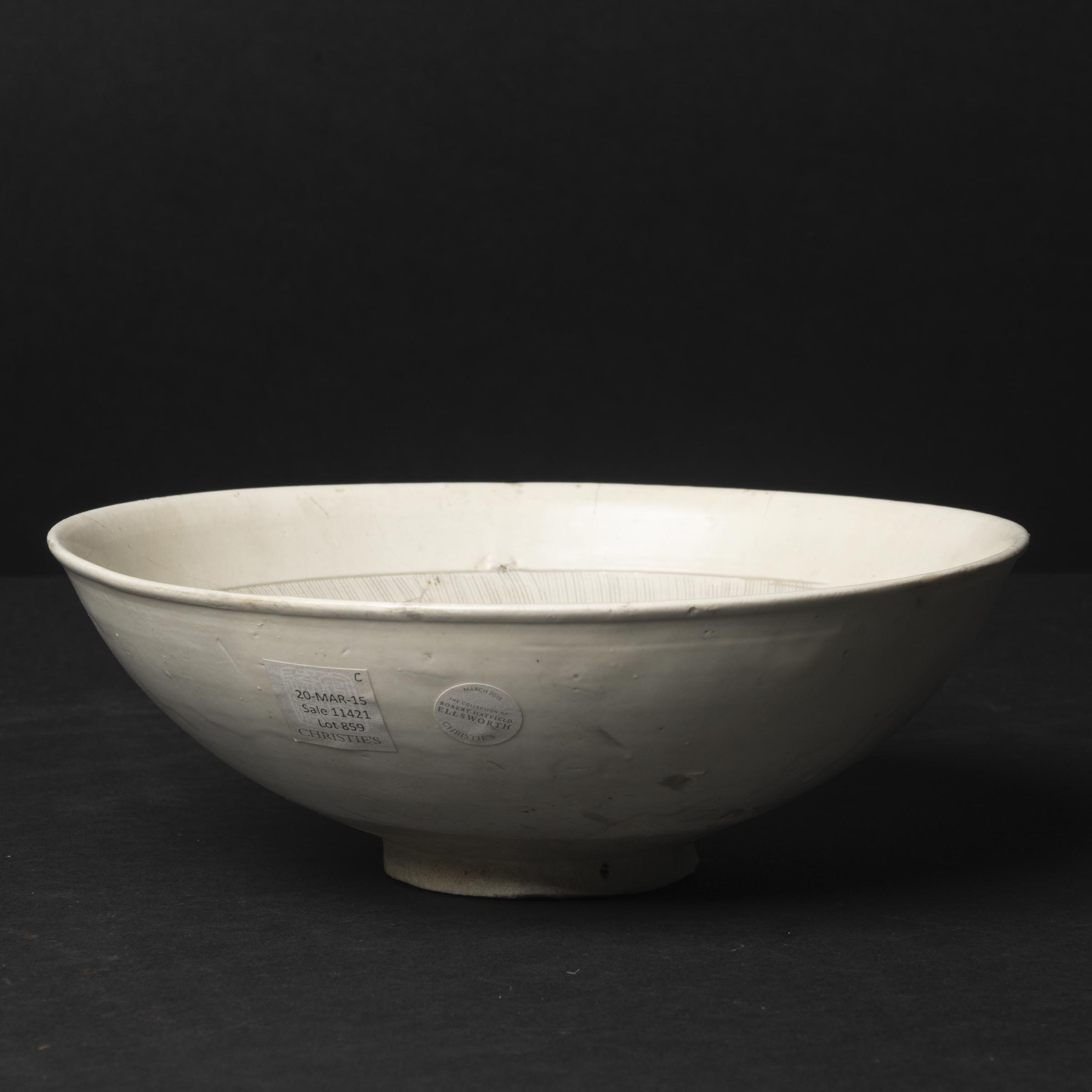 Appraisal: A Cizhou-Type White-Glazed Carved 'Floral' Bowl Jin Yuan Dynasty th-