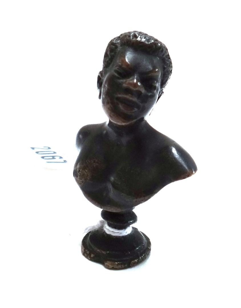 Appraisal: A miniature bronze bust early th century modelled and cast