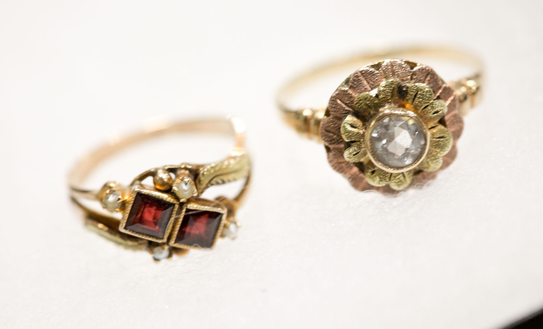 Appraisal: TWO RINGS Ring with dome-shaped top with bezel set light