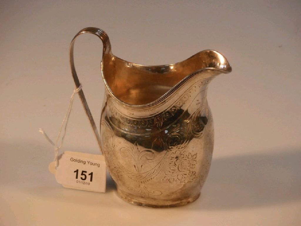 Appraisal: A George III silver helmet cream jug London makers mark