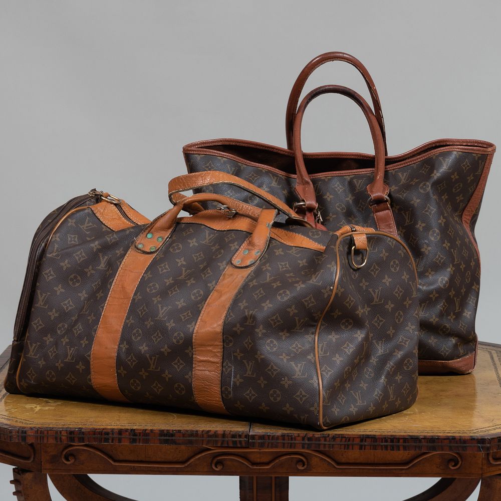 Appraisal: Two Louis Vuitton Travel Bags The largest in long John