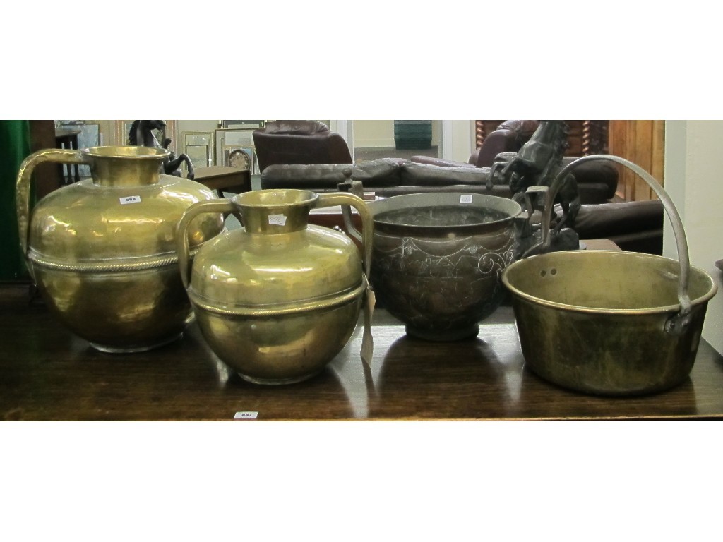 Appraisal: Brass jelly pan two brass vessels Eastern copper planter