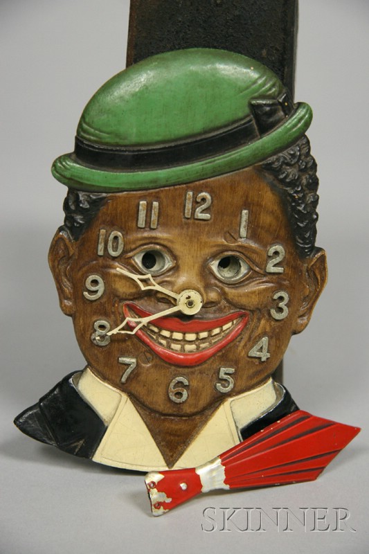 Appraisal: Animated Dixie Boy Pendulette Clock by Lux Clock Mfg Company