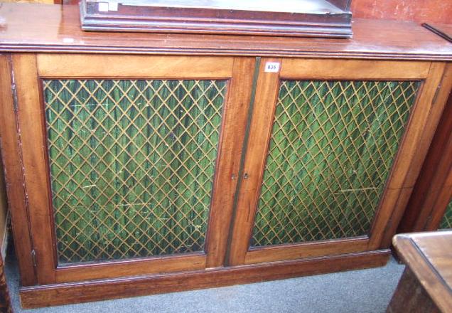 Appraisal: A pair of th century mahogany side cabinets the rectangular