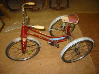 Appraisal: A Sunbeam Winkie child's tricycle tubular metal part chromium plated