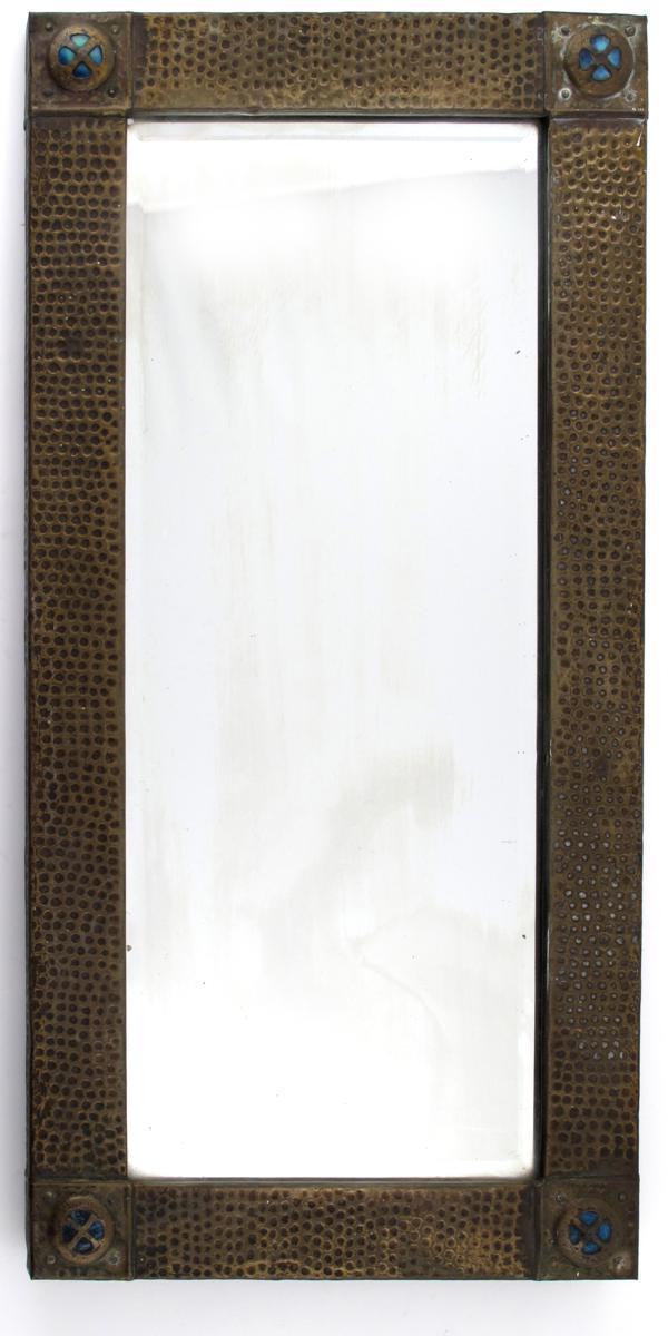 Appraisal: A brass wall mirror