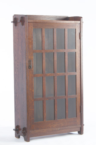 Appraisal: L J G STICKLEY Single-door bookcase with sixteen panes and