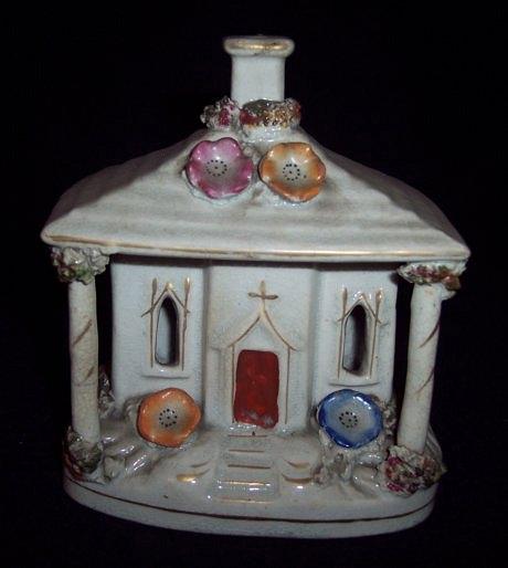 Appraisal: A Staffordshire pastille burner a cottage with pillars to the