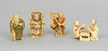 Appraisal: Another Set of Four Carved Netsukes Containing a standing man