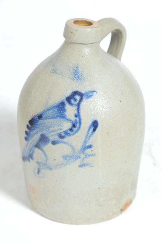 Appraisal: STONEWARE JUG American nd half- th century Brushed cobalt bird