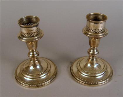 Appraisal: Pair Redlich Company sterling silver candlesticks Retailed by J E