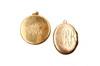 Appraisal: LOCKETS - Two ca gold lockets one round K yellow