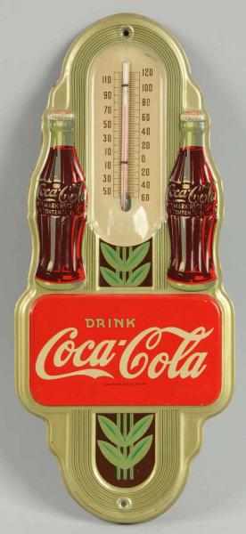 Appraisal: Coca-Cola Embossed Tin Thermometer Minor surface wear or marks only