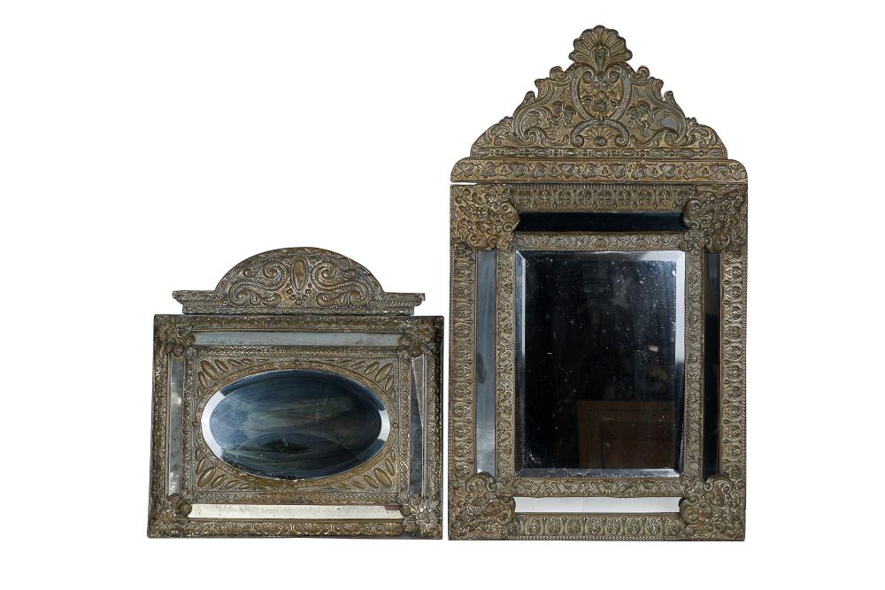 Appraisal: TWO METAL REPOUSSE-DECORATED WALL MIRRORSProvenance The Estate of Barron Hilton