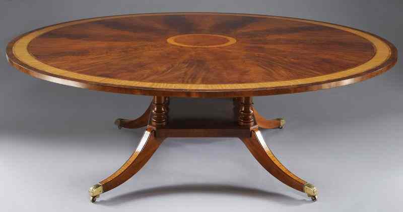 Appraisal: Regency style mahogany dining tablehaving a round top with inlaid