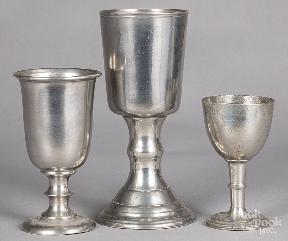 Appraisal: Three pewter chalices Three pewter chalices the middle example by