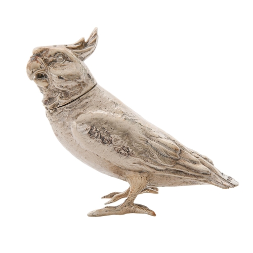 Appraisal: A Victorian silver crested cockatoo novelty pepperette the head forming