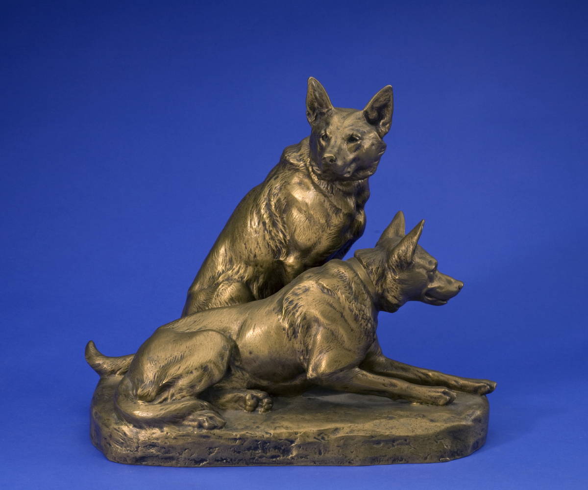 Appraisal: GOLD-PATINATED BRONZE OF TWO SHEPHERD DOGS AFTER LOUIS RICHE FRENCH