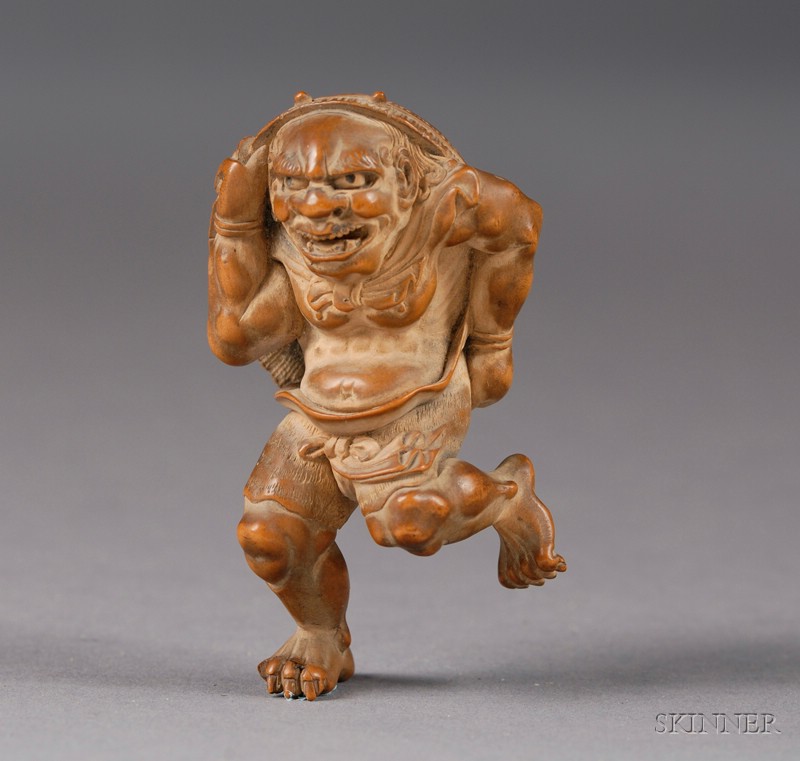 Appraisal: Boxwood Netsuke th th century a demon hiding under a