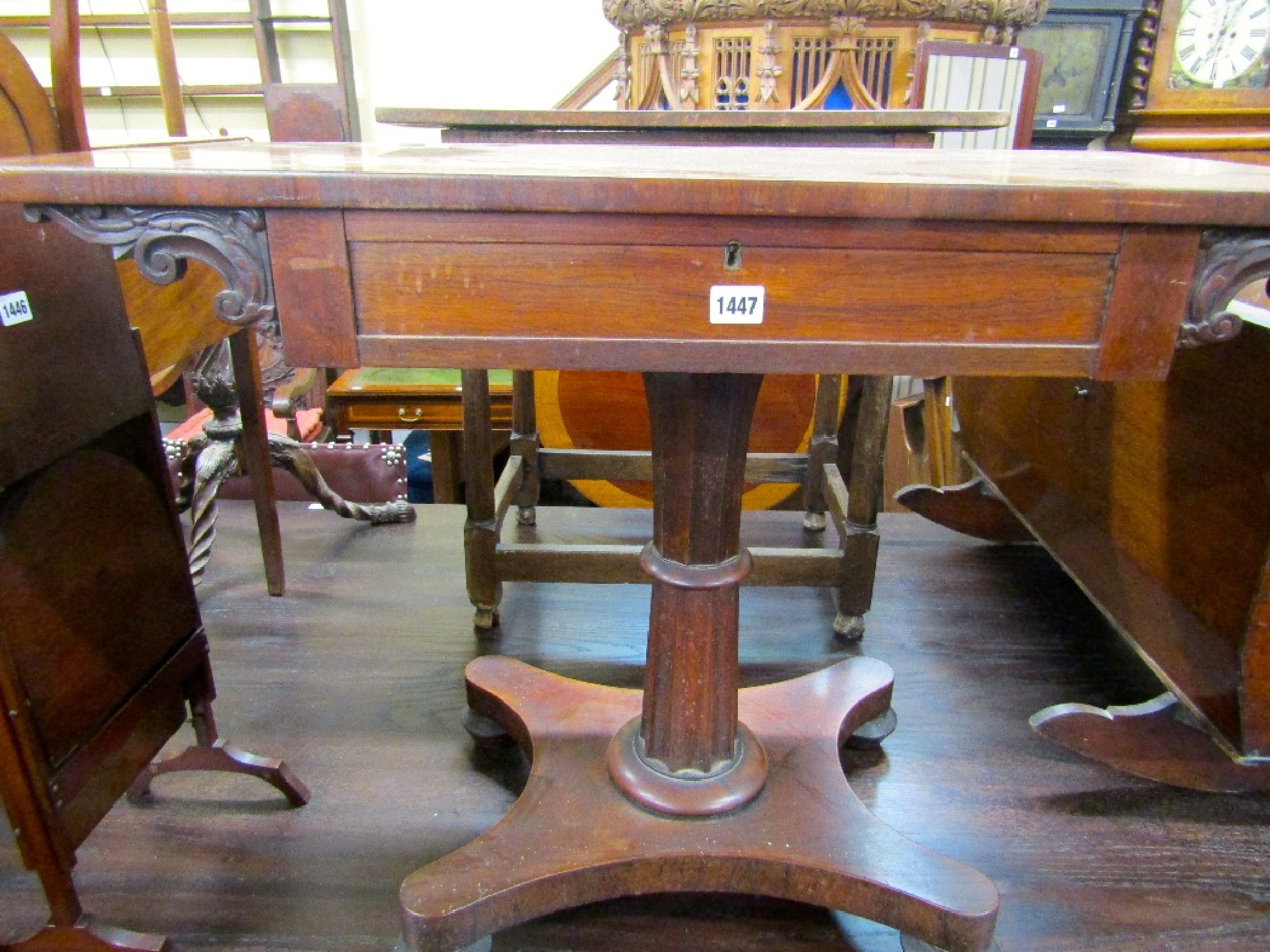 Appraisal: A mid- th century rosewood pedestal side table of rectangular