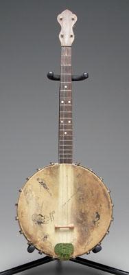 Appraisal: Four-string tenor banjo figured maple pot and neck mother-of-pearl inlay