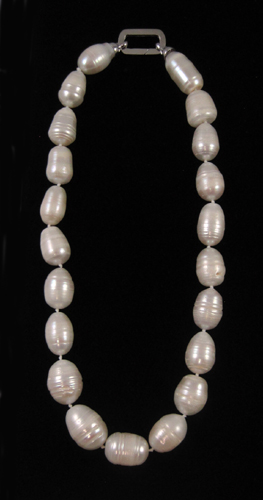 Appraisal: PRINCESS LENGTH WHITE PEARL NECKLACE measuring - inches in length